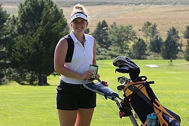 kerrigan with her golf bag