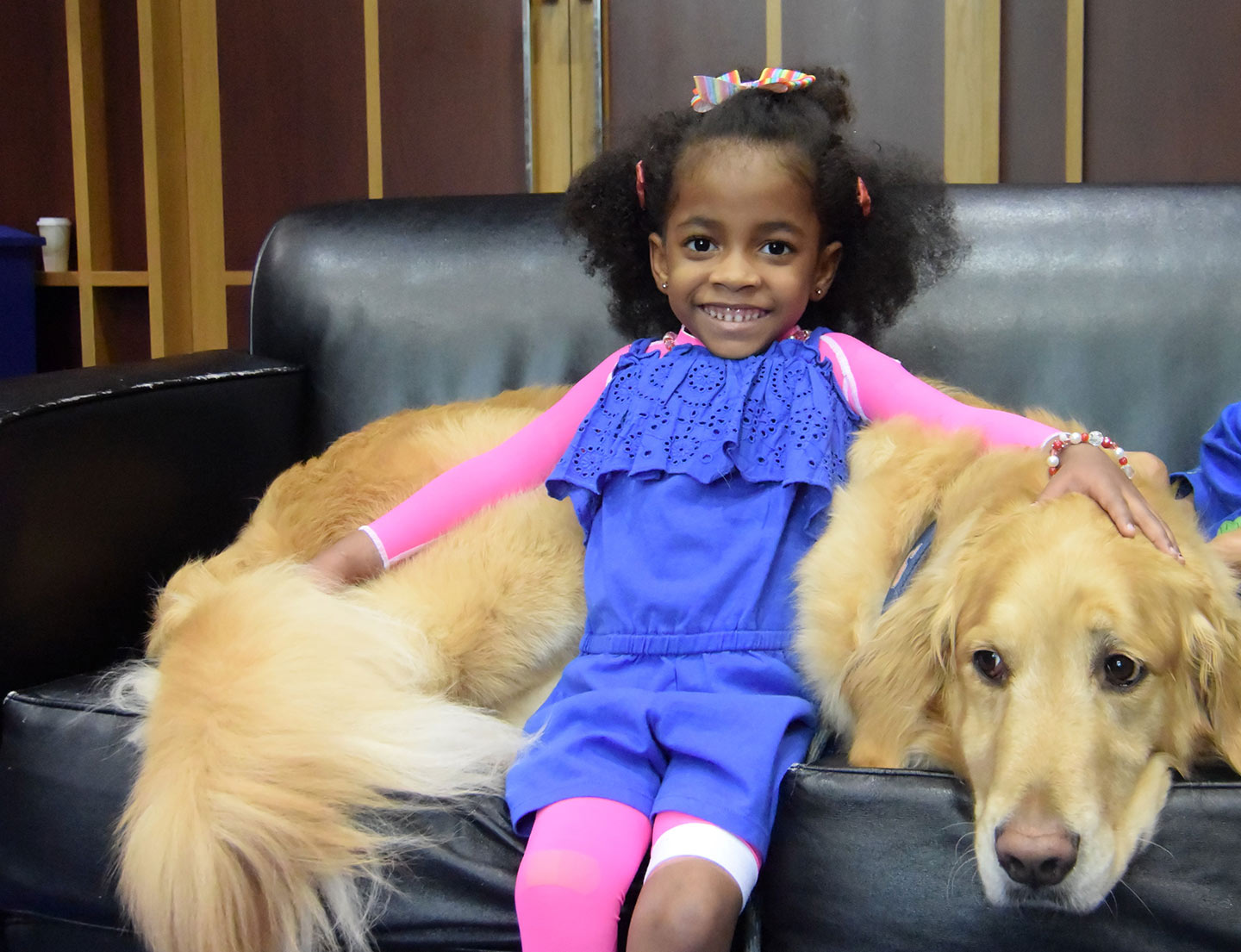 female patient with pet therapy dog